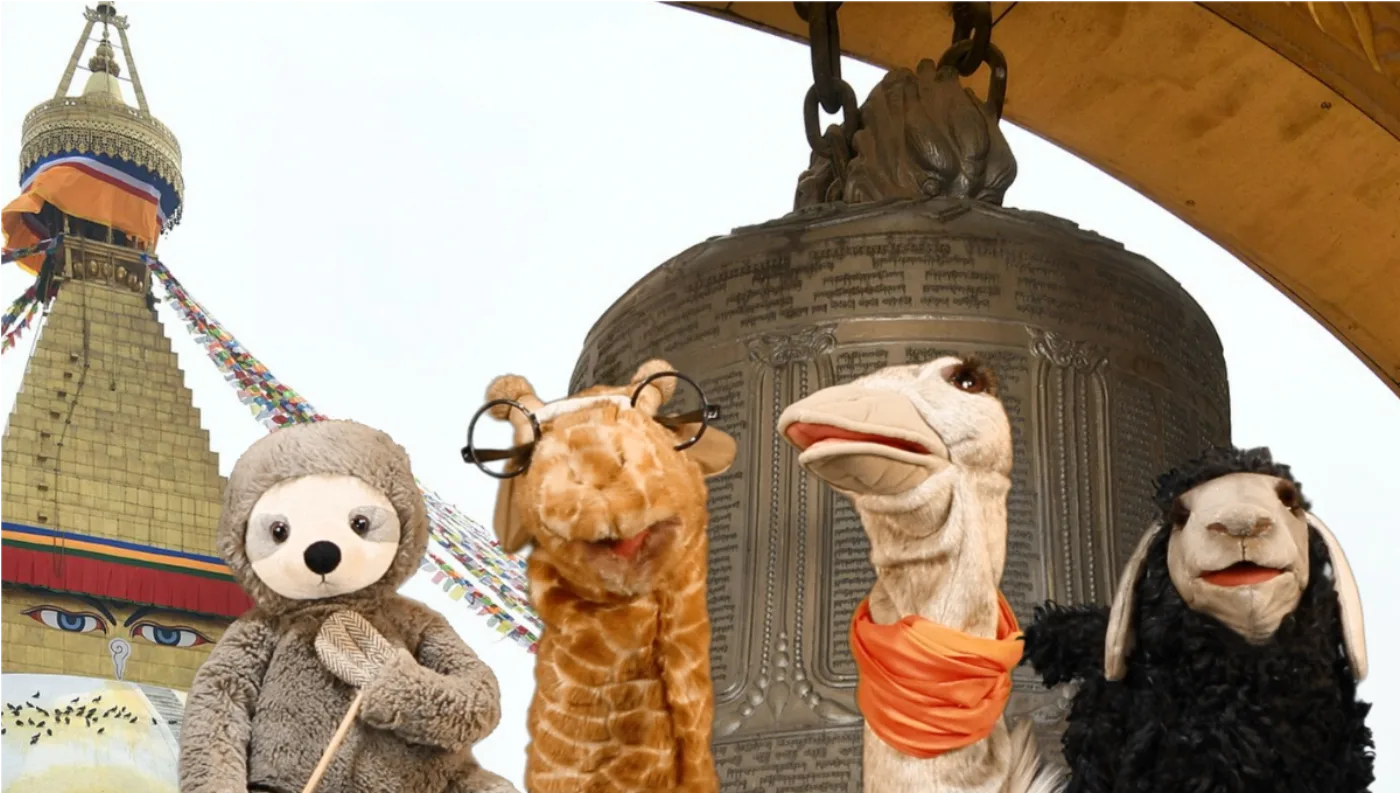 The non-human classmates — a sloth, a giraffe in glasses, an ostrich and a sheep — in front of a Tibetan stupa